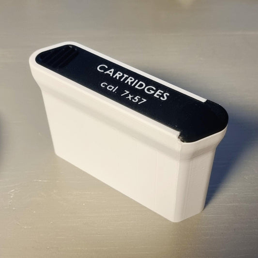 Ammunitionslåda med skjutlock.