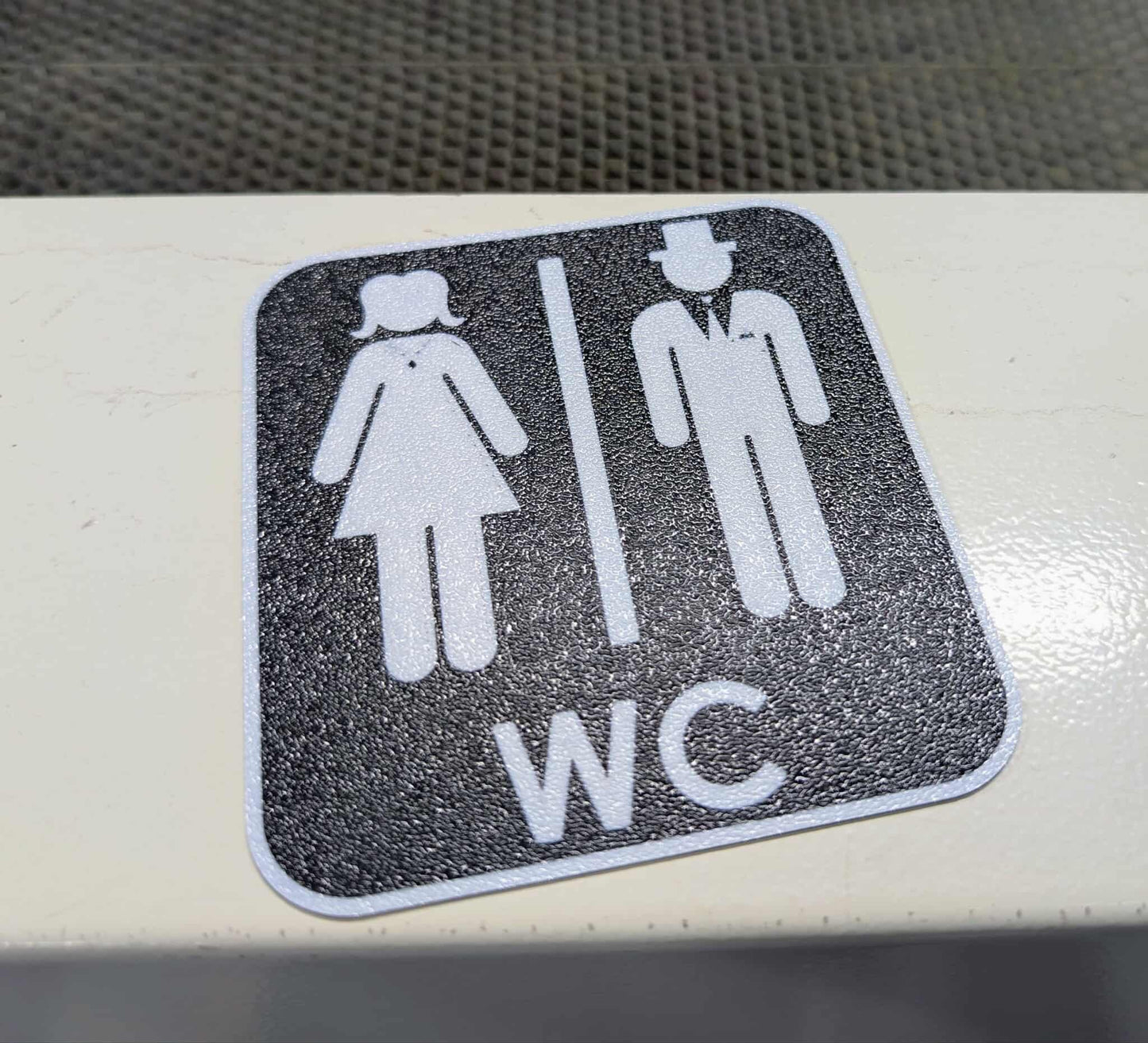 WC skylt