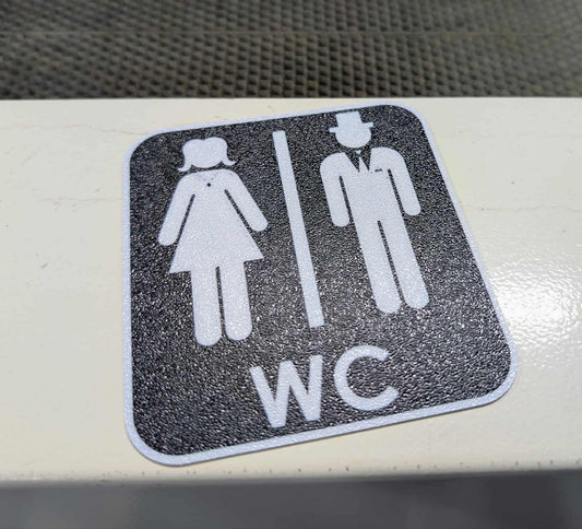 WC skylt