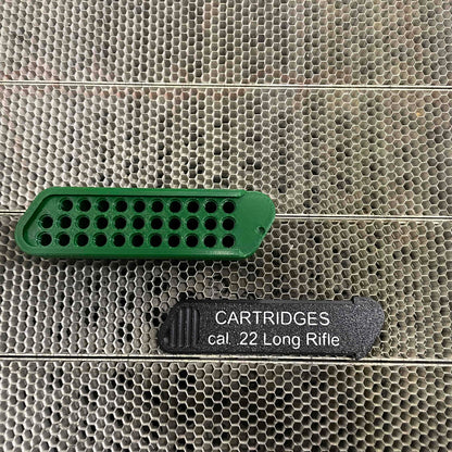 Ammunitionslåda med skjutlock.